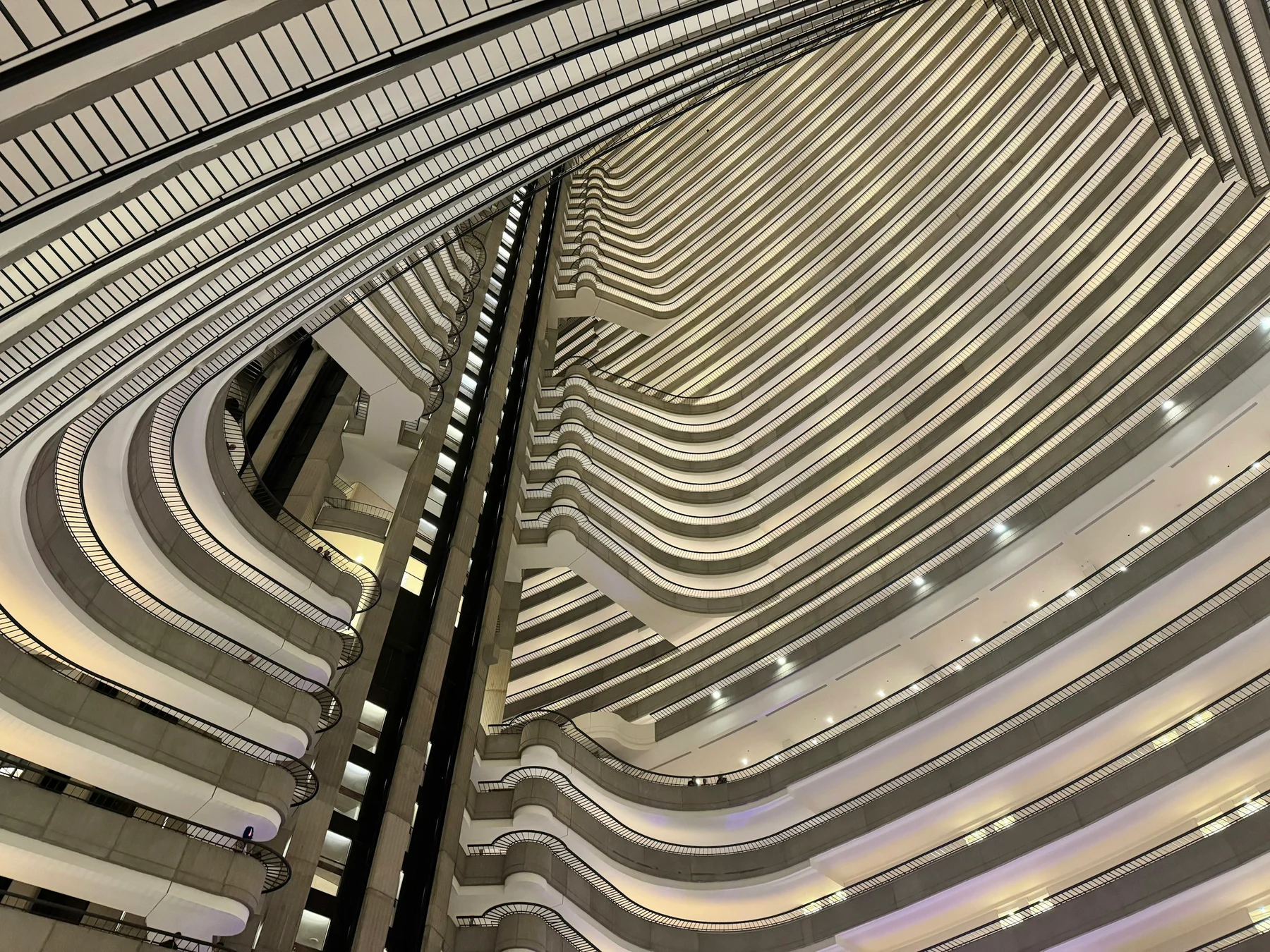 An open atrium defined by repeated architectural lines